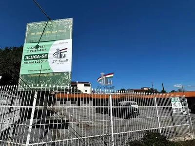 Loja comercial de esquina com 1210m² para alugar no Novo Mundo - Foto 10
