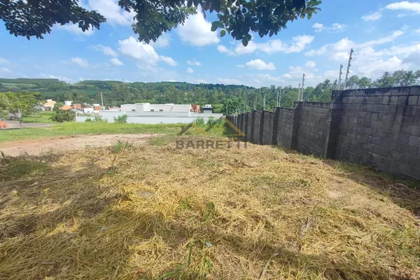 Terreno à venda no condomínio Portal do Horto, com 222,90m² e declive ao fundo. - Foto 3