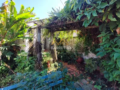 Casa à venda com 1.212 m², contendo quatro quartos, três salas, quatro banheiros e quatro vagas de garagem - Foto 39