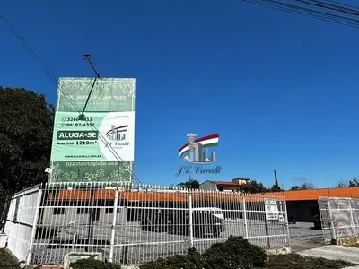 Loja comercial de esquina com 1210m² para alugar no Novo Mundo - Foto 3
