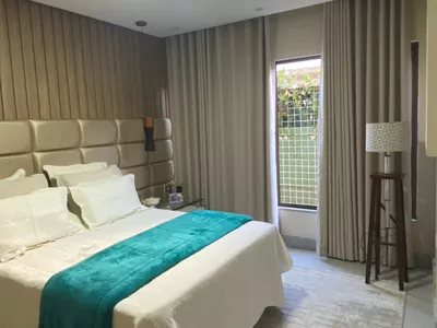 Linda Casa de 4 quartos sendo 3 suítes mais dependência completa e 4 vagas de garagem no Alphavill - Foto 22