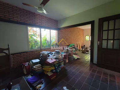Casa à venda com 1.212 m², contendo quatro quartos, três salas, quatro banheiros e quatro vagas de garagem - Foto 12