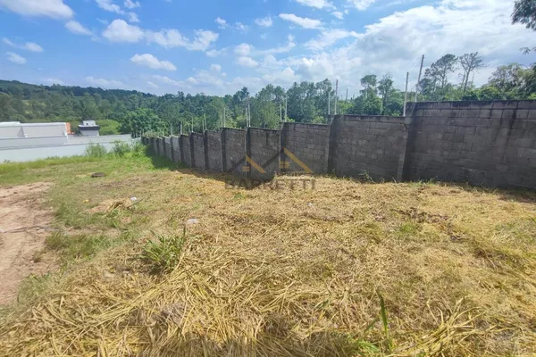 Terreno à venda no condomínio Portal do Horto, com 222,90m² e declive ao fundo. - Foto 5