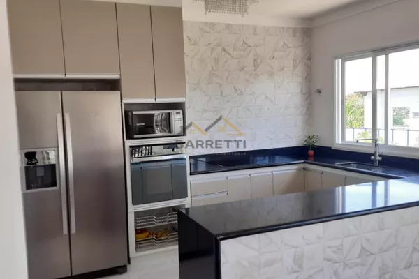 Casa de alto padrão à venda, com 1200m² de terreno, 4 quartos (3 suítes com closet), 4 banheiros e piscina, no Condomínio Colinas do Piracicaba - Foto 3