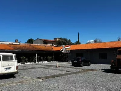 Loja comercial de esquina com 1210m² para alugar no Novo Mundo - Foto 4