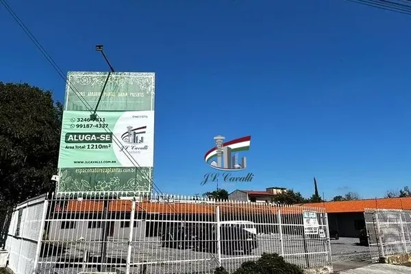 Loja comercial de esquina com 1210m² para alugar no Novo Mundo - Foto 3