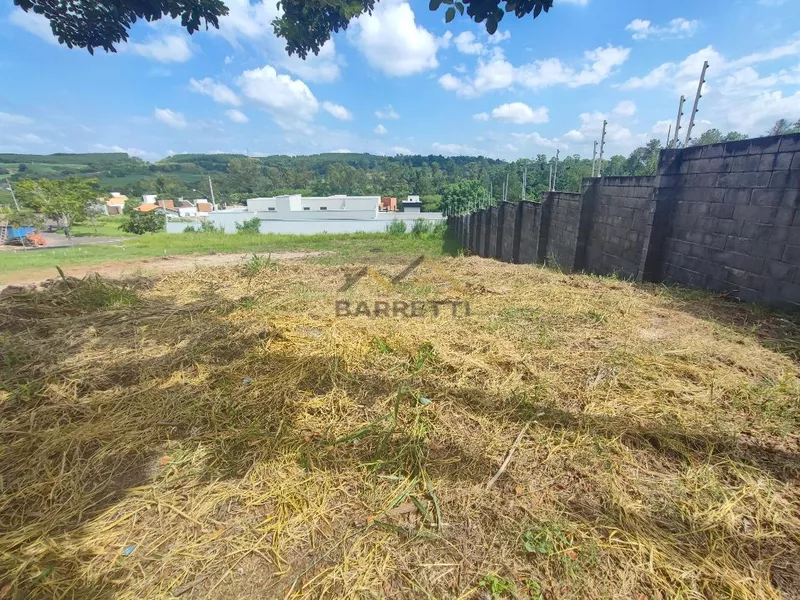 Terreno à venda no condomínio Portal do Horto, com 222,90m² e declive ao fundo. - Foto Principal