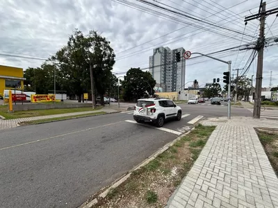 Loja comercial de esquina com 1210m² para alugar no Novo Mundo - Foto 20