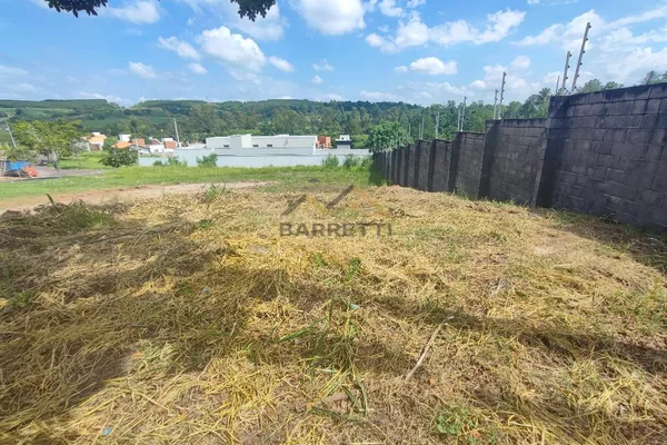 Terreno à venda no condomínio Portal do Horto, com 222,90m² e declive ao fundo. - Foto 1
