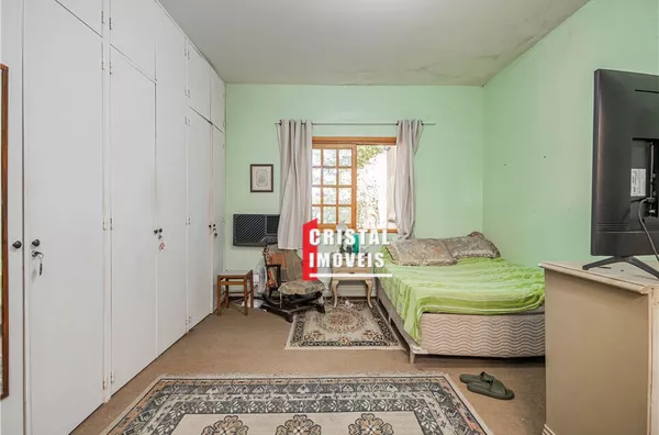 Casa 5 dormitórios a venda no Bairro Petrópolis em Porto Alegre