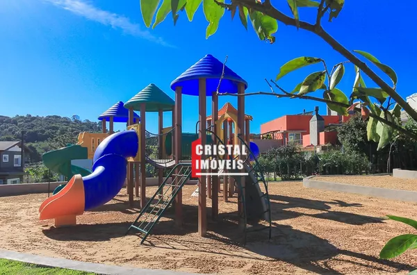 Casa em condomínio 5 dormitórios a venda no Bairro Vila Nova em Porto Alegre