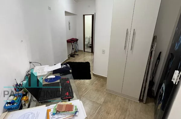 Dormitório com lavabo