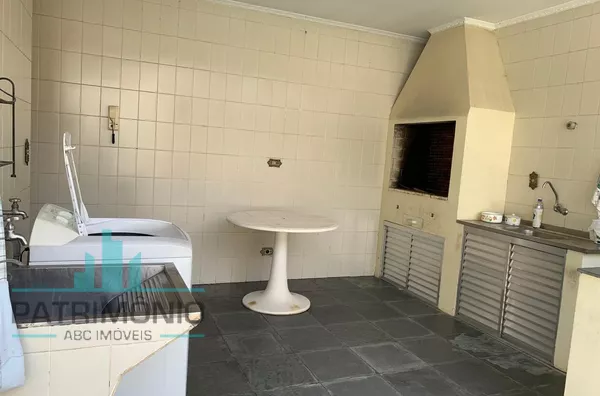 Espaço gourmet com área de serviço