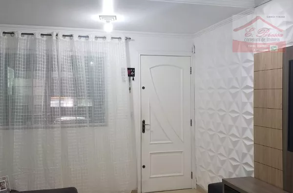 Casa com 2 suítes, 1 sala, 1 cozinha, 2 banheiros, 1 lavabo, 1 sótão, 1 área de serviço e 2 vagas de garagem  