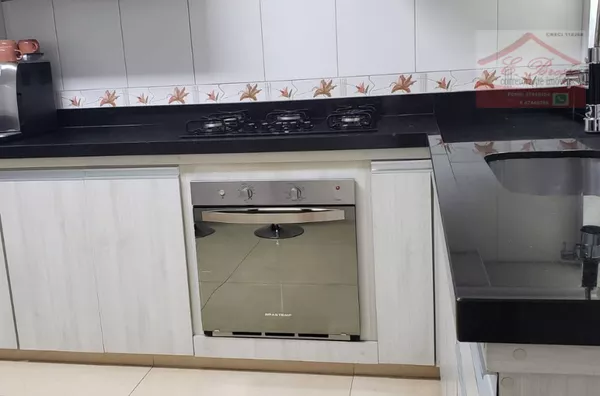 Casa com 2 suítes, 1 sala, 1 cozinha, 2 banheiros, 1 lavabo, 1 sótão, 1 área de serviço e 2 vagas de garagem - Foto 6