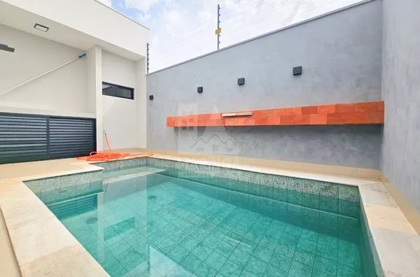Piscina da casa com 3 suítes e piscina no Jd. Munique