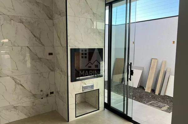 churrasqueira em porcelanato e acabamento em inox