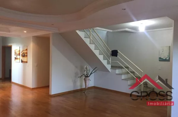 Sobrado a venda no Centro de Capanema Pr, contendo 3 quartos, 1 súite com hidro e closet, cozinha planejada, escritório, 2 salas, 4 banheiros, área gourmet, lavanderia, terreno de 500m², área construída de 342m². - Foto 6