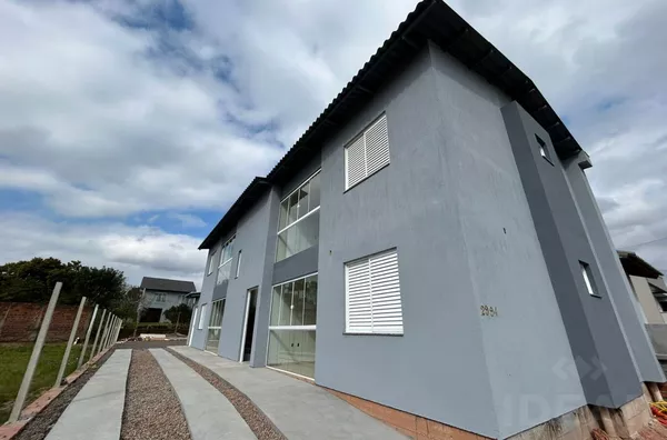 QUATRO APARTAMENTOS DE DOIS DORMITÓRIOS E VAGA DE GARAGEM