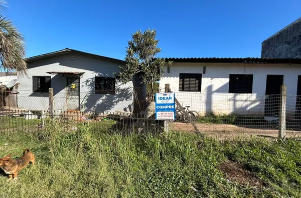 TERRENO DE 330m² COM CASA DE ALVENARIA