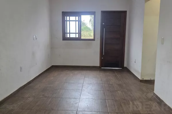 CASA COM PÁTIO NA FRENTE E FUNDOS NA SANTA TECLA