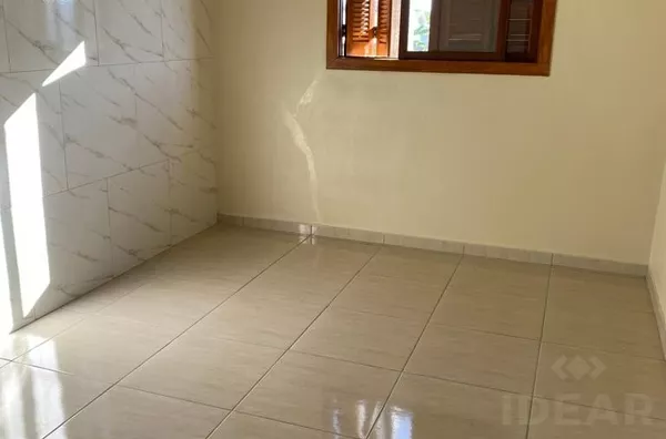 GEMINADO AMPLO E BEM LOCALIZADO, COM RUA ASFALTADA