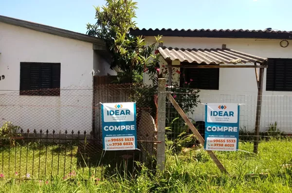 TERRENO DE 330m² COM CASA DE ALVENARIA