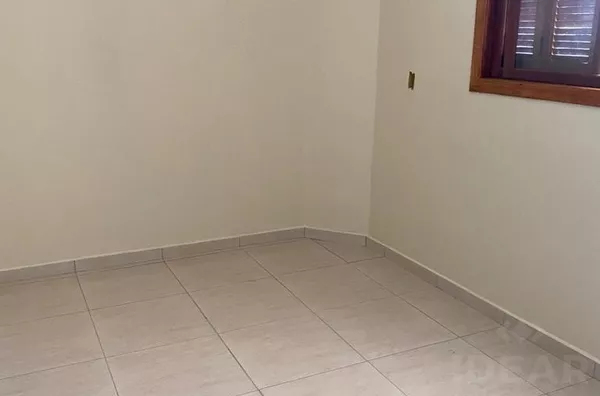 GEMINADO AMPLO E BEM LOCALIZADO, COM RUA ASFALTADA