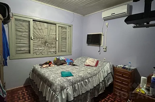 CASA COM 3 DORMITÓRIOS E QUIOSQUE NOS FUNDOS