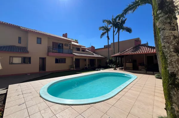 CASA DE 2 PISOS COM ÁREA COMERCIAL INTEGRADA - Foto 13