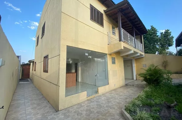 IMÓVEL DE DOIS PISOS, SENDO A BASE COMERCIAL E O SEGUNDO PISO RESIDENCIAL