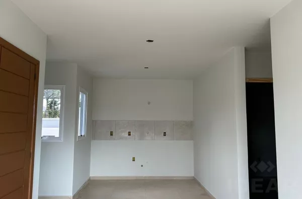 QUATRO APARTAMENTOS DE DOIS DORMITÓRIOS E VAGA DE GARAGEM