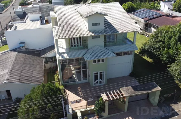 CASA AMPLA NO 2º PISO COM BASE COMERCIAL DE PÉ DIREITO DUPLO PARA QUALQUER TIPO DE EMPRESA