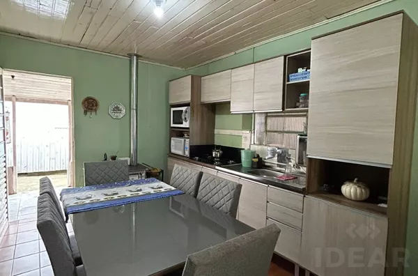 CASA DE ALVENARIA, COM 2 VGAS DE GARAGEM COBERTAS