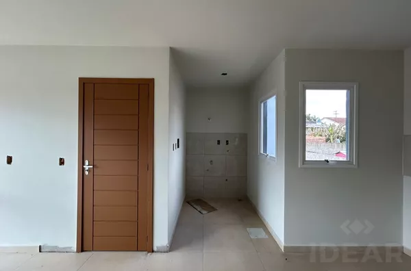 QUATRO APARTAMENTOS DE DOIS DORMITÓRIOS E VAGA DE GARAGEM