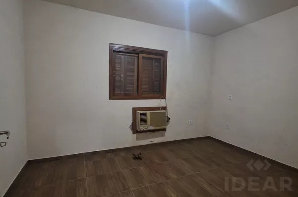CASA COM PÁTIO NA FRENTE E FUNDOS NA SANTA TECLA