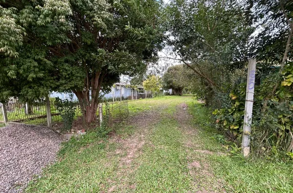 CASA DE TIJOLOS A VISTA COM DE 58m² E TERRENO DE 847m²