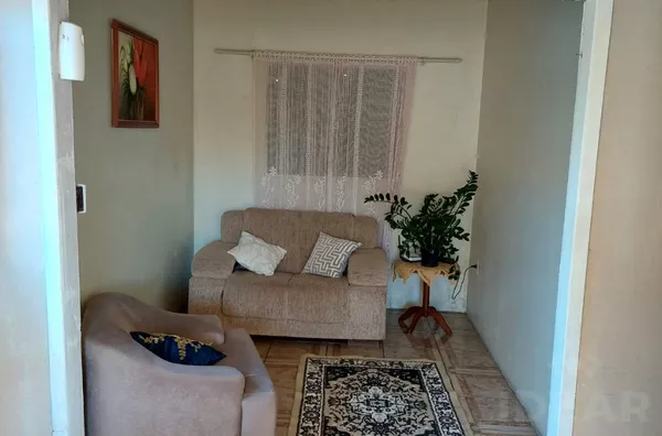 AMPLA CASA DE 5 DORMITÓRIOS E TERRENO TODO CERCADO