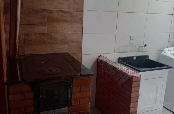 GEMINADO ESPAÇOSO, COM  PÁTIO FECHADO E VAGA DE GARAGEM