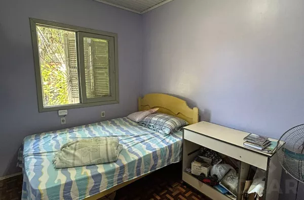 CASA COM 3 DORMITÓRIOS E QUIOSQUE NOS FUNDOS