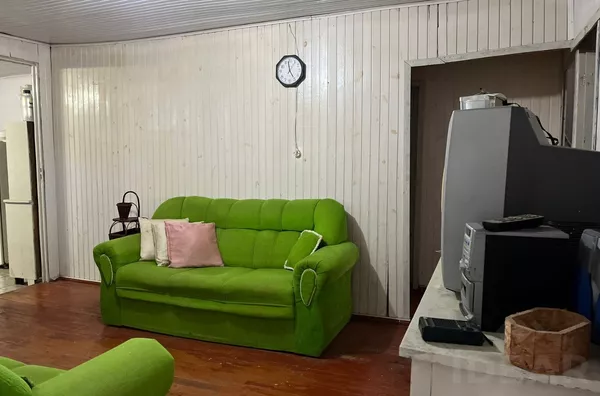 TERRENO BEM LOCALIZADO COM CASA MISTA 