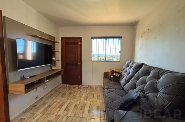 CASA COM DOIS DORMITÓRIOS A 300m DA RSC-453