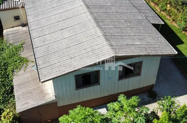 Terreno para venda contendo casa mista - João Paulo II - Realeza/PR