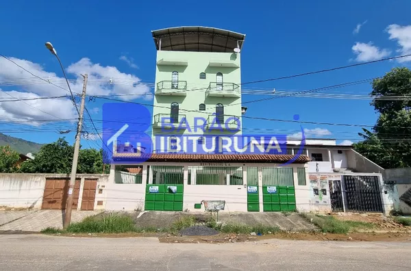 Prédio com 7 moradas