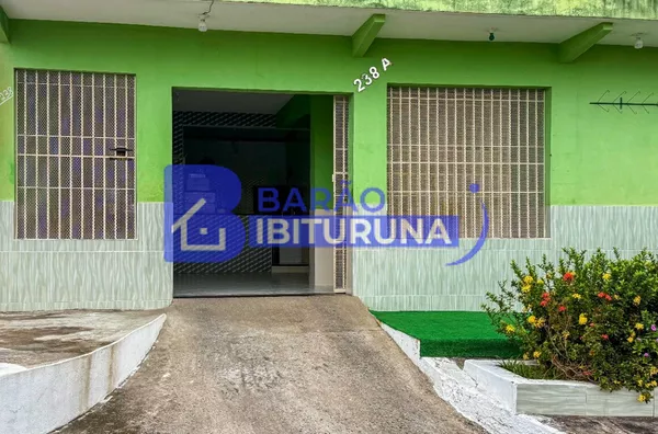 Prédio com ponto comercial e apartamento