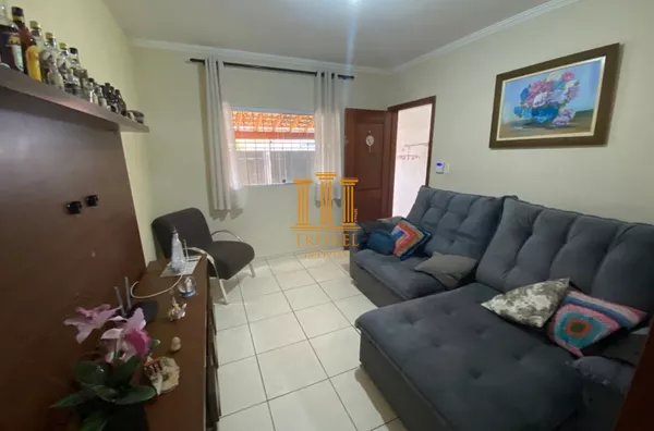 Casa 2 Dorm com garagem coberta e quintal 