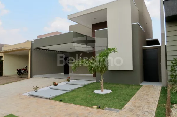 Linda Casa no condomínio Terras do Jupiá, Casa com 03(três) quartos , sendo 01(uma)suíte master com closet , 01(uma) suíte, 01(um) quarto, 01(uma) sala com pé direito alto, 01 (uma) cozinha com balcão em formato de ilha e planejados, 01 (uma) área de serv