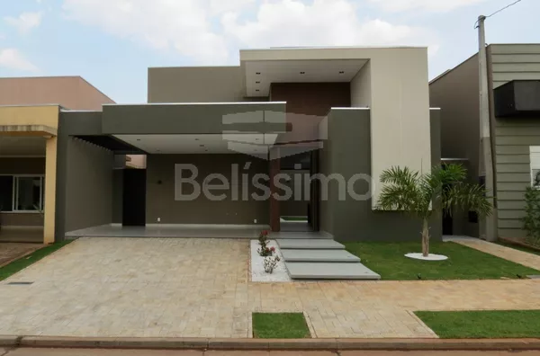 Linda Casa no condomínio Terras do Jupiá, Casa com 03(três) quartos , sendo 01(uma)suíte master com closet , 01(uma) suíte, 01(um) quarto, 01(uma) sala com pé direito alto, 01 (uma) cozinha com balcão em formato de ilha e planejados, 01 (uma) área de serv