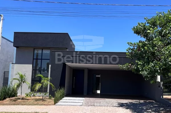 Casa excelente localizada no Condomínio Costa Leste. Casa com 03 (Três) quartos, sendo 01 (um) suíte, 02 (dois) banheiros, 01(um) lavabo, 01 (uma) sala com pé direito alto, 01 (uma) cozinha com balcão, 01 (um) hall, 01 (uma) lavanderia e com garagem para - Foto 1