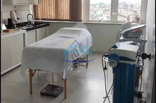 Centro aluga ou venda Sala comercial e Edifício Caravelas